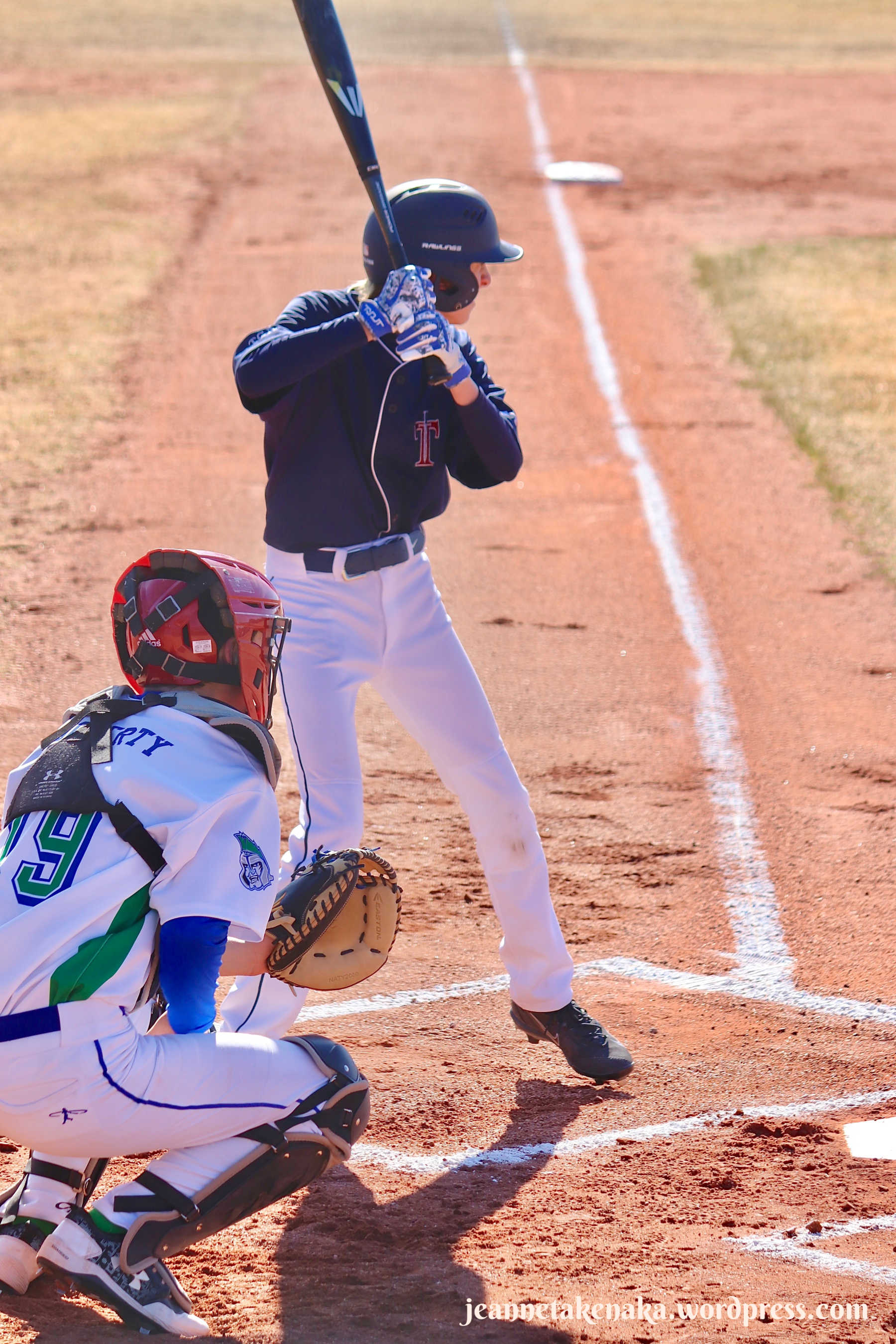 Perspective: Boy at home plate in batting position